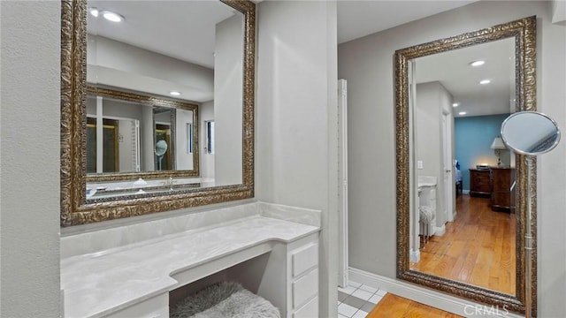 12782 Periwinkle Dr, North Tustin, CA 92705 - bathroom featuring baseboards, vanity, and recessed lighting