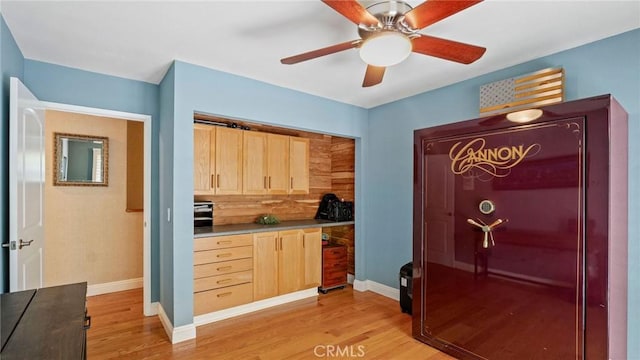 12782 Periwinkle Dr, North Tustin, CA 92705 - bar featuring light wood finished floors, baseboards, and ceiling fan