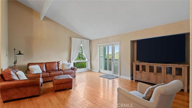 12782 Periwinkle Dr, North Tustin, CA 92705 - living room featuring wood-type flooring, beamed ceiling, baseboards, and high vaulted ceiling