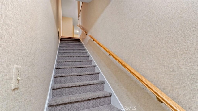 12782 Periwinkle Dr, North Tustin, CA 92705 - staircase with a textured wall