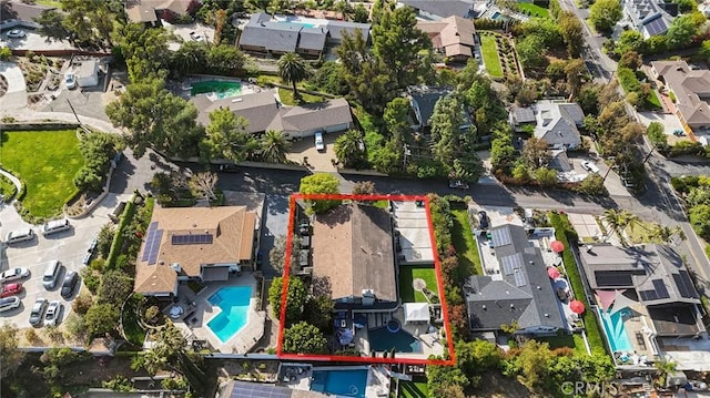 12782 Periwinkle Dr, North Tustin, CA 92705 - aerial perspective of suburban area with a pool area and property boundaries highlighted