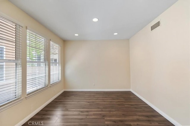 27020 Island Rd, Valencia, CA 91355 - unfurnished room with dark wood-type flooring and recessed lighting