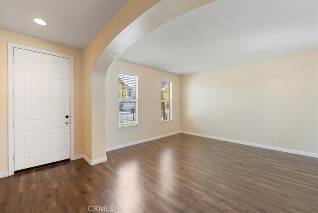 27020 Island Rd, Valencia, CA 91355 - entryway featuring arched walkways, wood finished floors, and recessed lighting