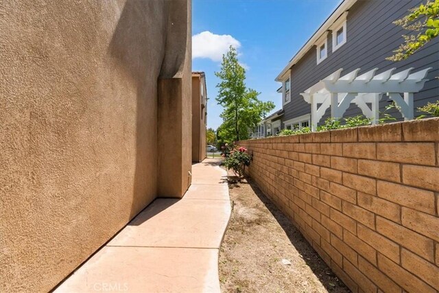 27020 Island Rd, Valencia, CA 91355 - view of home's exterior with stucco siding