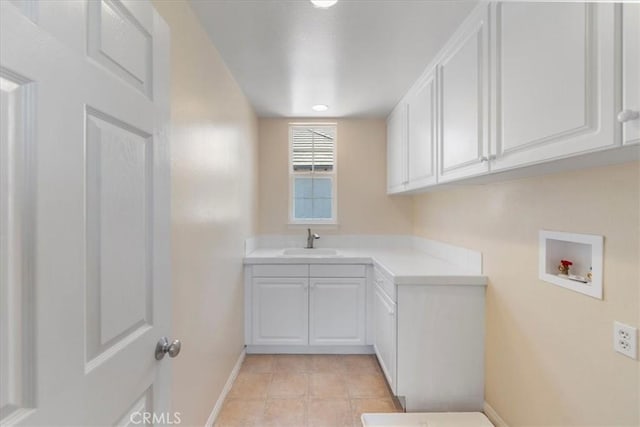 27020 Island Rd, Valencia, CA 91355 - laundry room featuring cabinet space, hookup for a washing machine, and light tile patterned flooring