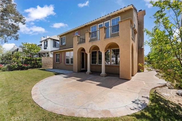 27020 Island Rd, Valencia, CA 91355 - back of house with stucco siding, a patio, a balcony, and a tiled roof
