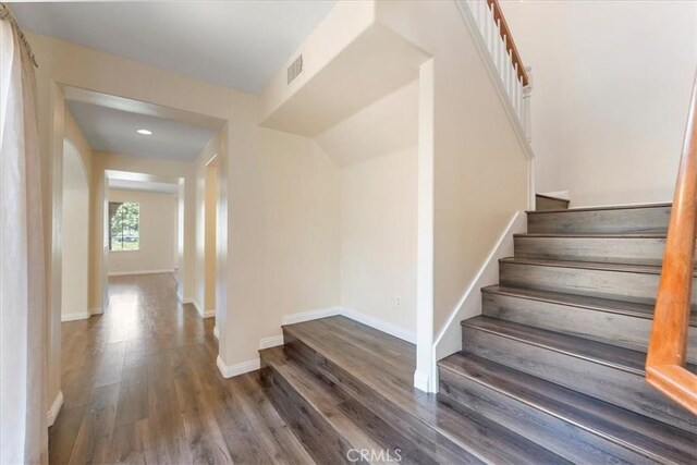 27020 Island Rd, Valencia, CA 91355 - stairs with wood finished floors and baseboards