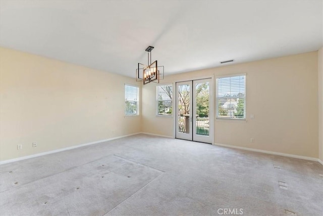 27020 Island Rd, Valencia, CA 91355 - empty room with carpet floors and a chandelier