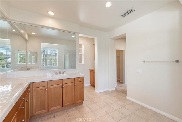 27020 Island Rd, Valencia, CA 91355 - bathroom featuring vanity, recessed lighting, and tile patterned floors