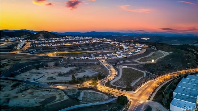 aerial view at dusk with a mountain view