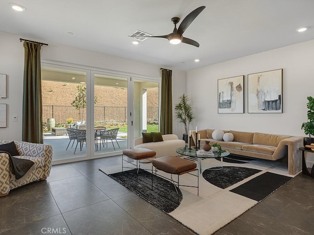 living area featuring ceiling fan, recessed lighting, and visible vents