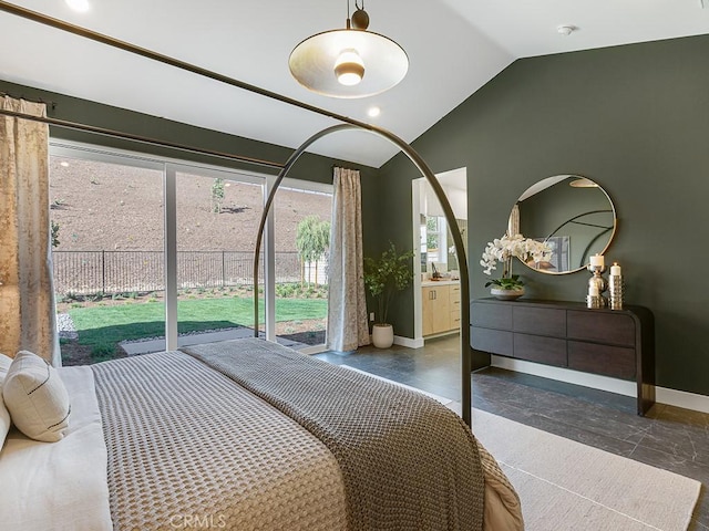 bedroom with baseboards and vaulted ceiling