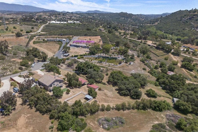 drone / aerial view featuring a mountain view