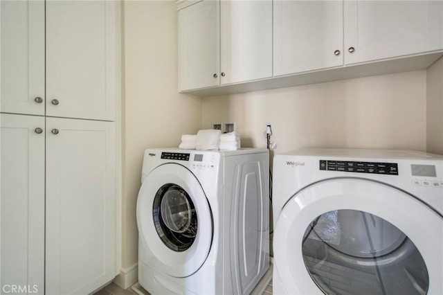 118 Tritone, Irvine, CA 92602 - laundry area featuring cabinet space and washing machine and clothes dryer