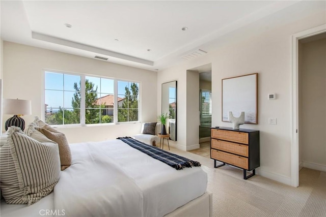 118 Tritone, Irvine, CA 92602 - bedroom with a tray ceiling, light colored carpet, baseboards, and visible vents