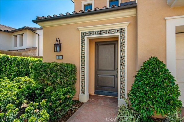 118 Tritone, Irvine, CA 92602 - property entrance with stucco siding
