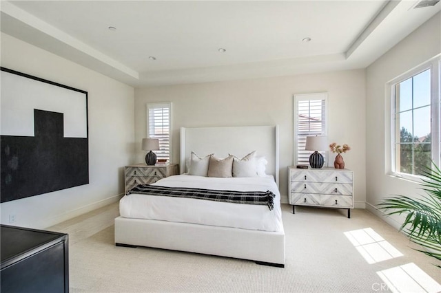 118 Tritone, Irvine, CA 92602 - bedroom featuring baseboards, carpet flooring, and a tray ceiling