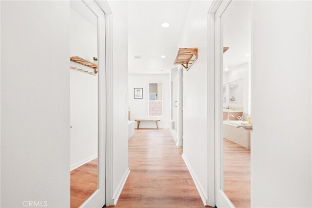 4934 Herzog Way, Palm Springs, CA 92262 - hall with light wood-style floors and recessed lighting