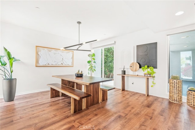 4934 Herzog Way, Palm Springs, CA 92262 - kitchen featuring light wood-style flooring and a chandelier