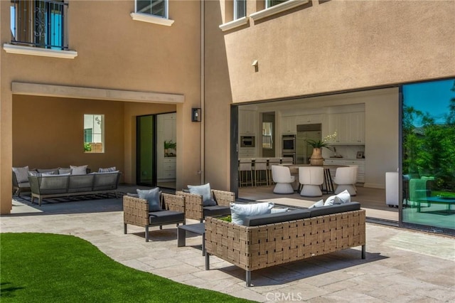 view of patio with an outdoor living space