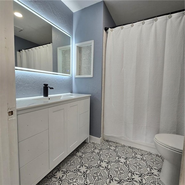 full bathroom with vanity, tile patterned flooring, toilet, and a shower with shower curtain