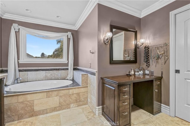 bathroom with ornamental molding, a garden tub, and vanity