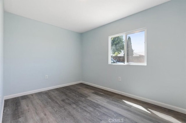 108 2nd St, Taft, CA 93268 - spare room featuring wood finished floors