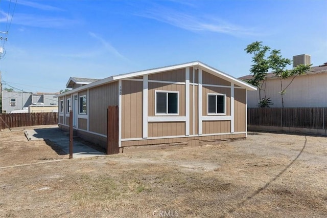 view of outdoor structure featuring a fenced backyard