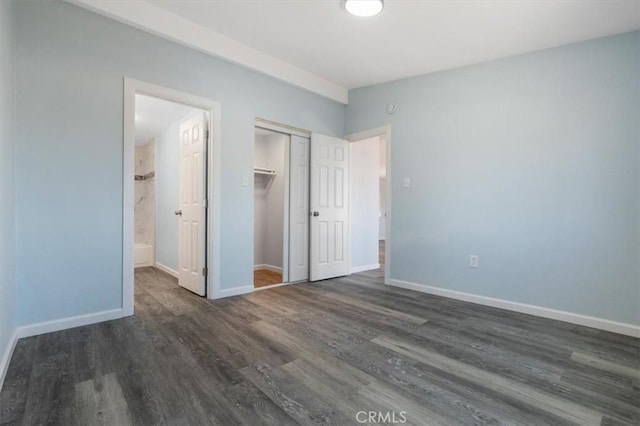 108 2nd St, Taft, CA 93268 - unfurnished bedroom featuring wood finished floors, a closet, and connected bathroom