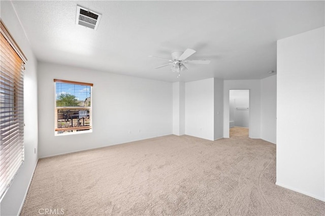 9331 Sapphire Ave, Hesperia, CA 92344 - unfurnished room featuring light colored carpet and ceiling fan