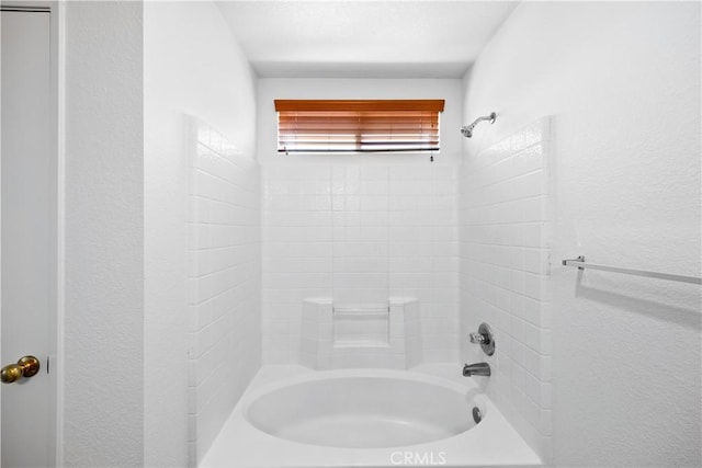 9331 Sapphire Ave, Hesperia, CA 92344 - full bathroom featuring tub / shower combination and a textured wall