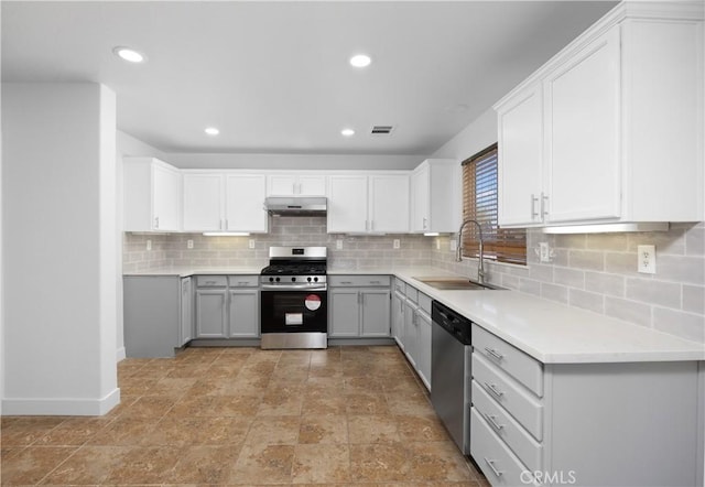 9331 Sapphire Ave, Hesperia, CA 92344 - kitchen with appliances with stainless steel finishes, a sink, decorative backsplash, light countertops, and recessed lighting
