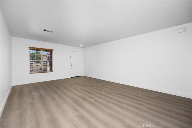 9331 Sapphire Ave, Hesperia, CA 92344 - spare room featuring wood finished floors and baseboards