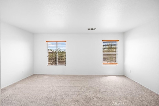 9331 Sapphire Ave, Hesperia, CA 92344 - unfurnished room with carpet floors and baseboards
