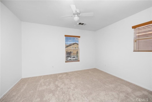 9331 Sapphire Ave, Hesperia, CA 92344 - spare room featuring carpet floors, a ceiling fan, and baseboards