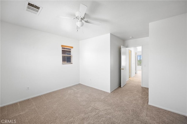 9331 Sapphire Ave, Hesperia, CA 92344 - spare room with light colored carpet, ceiling fan, and baseboards