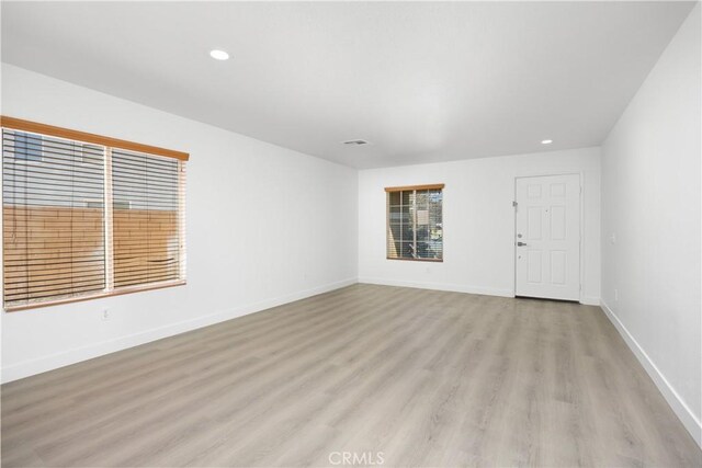 9331 Sapphire Ave, Hesperia, CA 92344 - unfurnished room featuring light wood-style flooring, recessed lighting, and baseboards