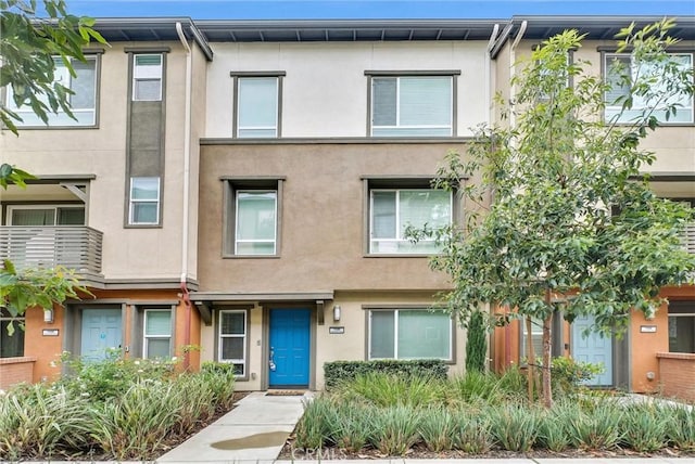 view of property featuring stucco siding