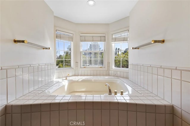 10703 Wheatland Ave, Sunland, CA 91040 - full bathroom featuring a healthy amount of sunlight and a garden tub