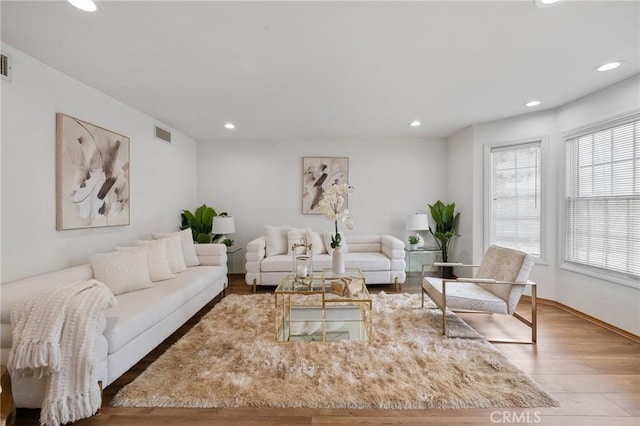 10703 Wheatland Ave, Sunland, CA 91040 - living area featuring recessed lighting, visible vents, and wood finished floors