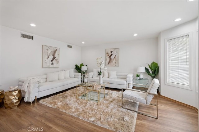 10703 Wheatland Ave, Sunland, CA 91040 - living room with recessed lighting, baseboards, visible vents, and light wood-style flooring