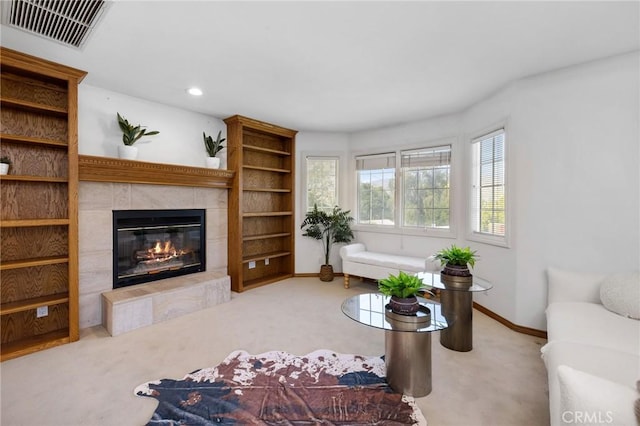 10703 Wheatland Ave, Sunland, CA 91040 - carpeted living area featuring visible vents, recessed lighting, baseboards, and a tiled fireplace