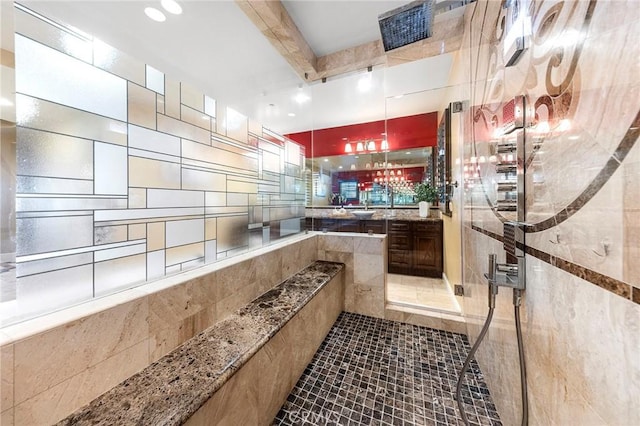 interior space with a sink, tile patterned flooring, stone countertops, and recessed lighting