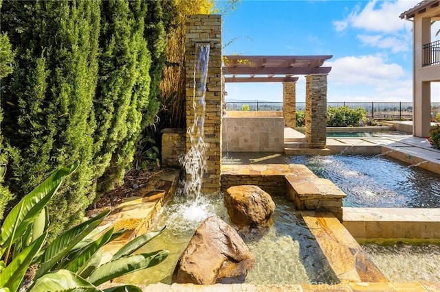 view of yard featuring fence, a fenced in pool, and a pergola
