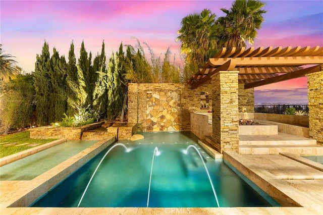 view of pool at dusk