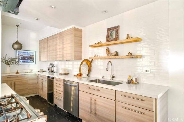 kitchen with a sink, backsplash, dishwasher, and light brown cabinetry