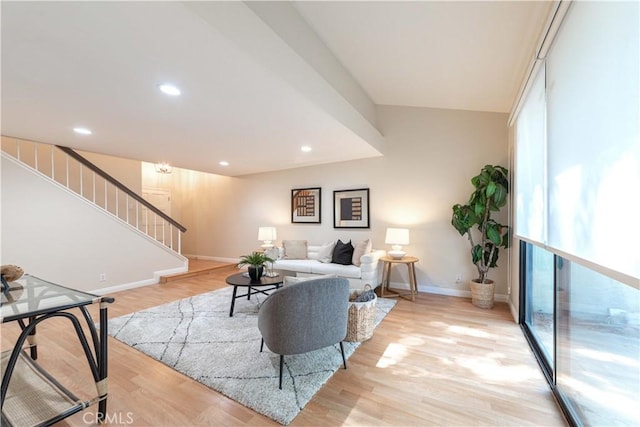 living room with stairway, baseboards, recessed lighting, and light wood-type flooring