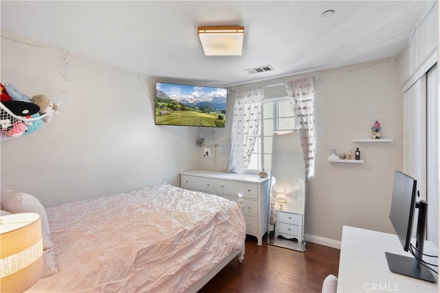 6239 Longmeadow St, Riverside, CA 92505 - bedroom featuring dark wood-style floors and a closet