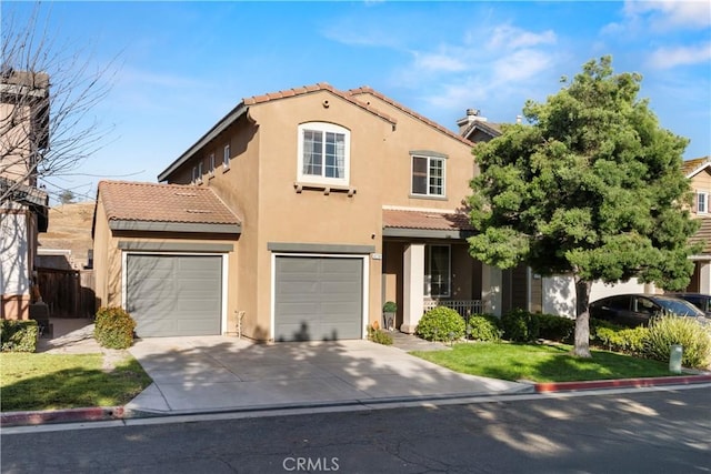 6239 Longmeadow St, Riverside, CA 92505 - view of front of home with a tiled roof, stucco siding, and concrete driveway