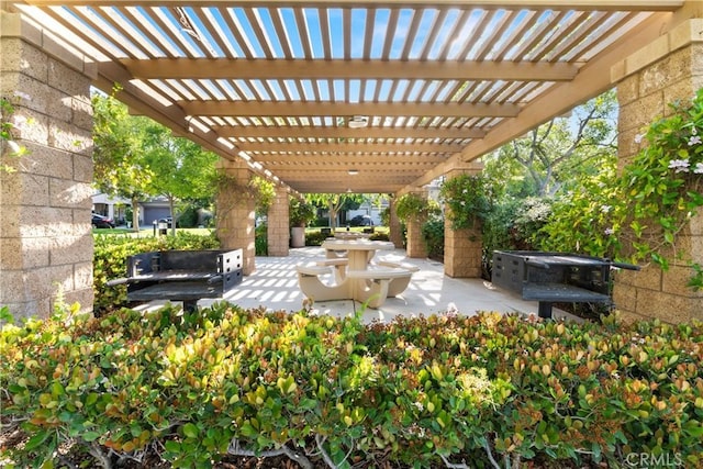 view of patio featuring a pergola